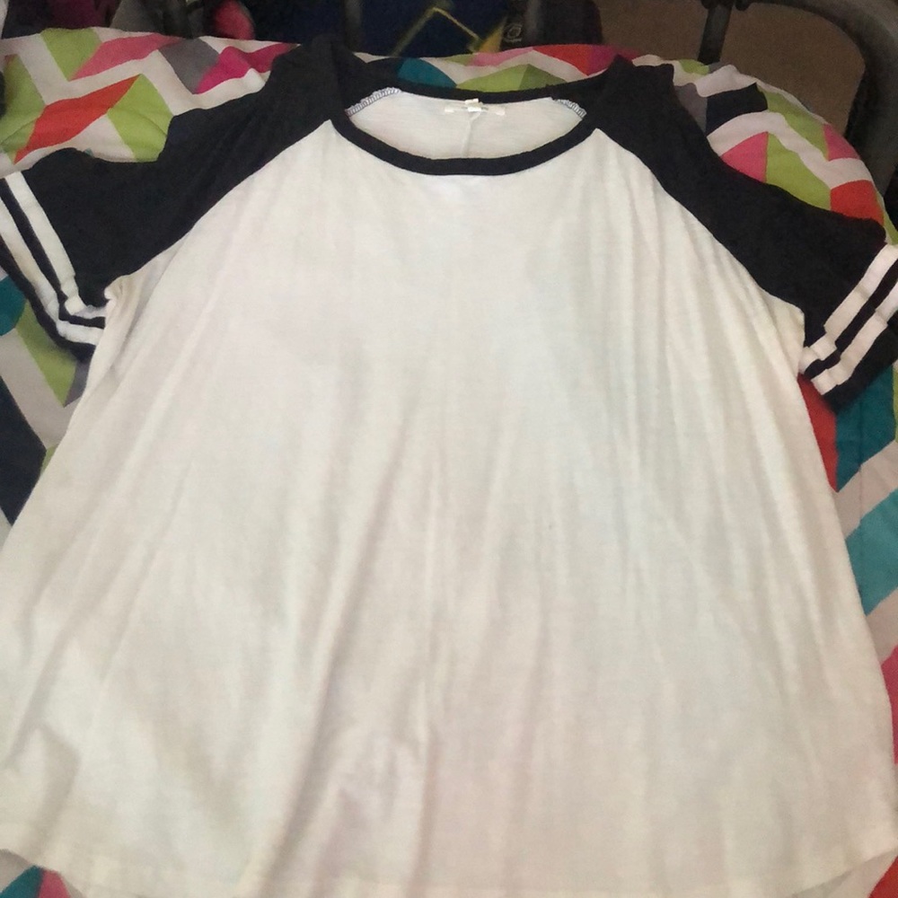 White and black open shoulder shirt